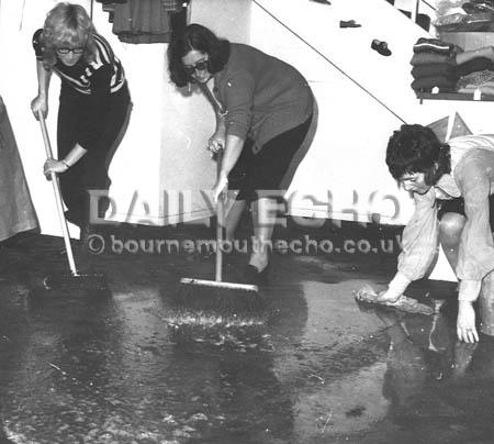 Workers clean up at the Arndale Centre in Poole after it was flooded in the storms of 1972.