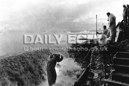 Workmen tackled storm damage on Bournemouth beach in January 1988 after rough seas carved out a 60ft length of the promenade.
