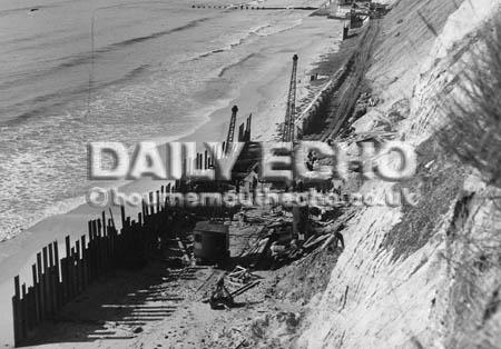 Council workmen work on the cliff defences at Southbourne in 1954.