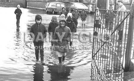 During the storms of 1972 several places suffered flooding, including this school playground in the Purbecks.  Picture by Arthur Grant