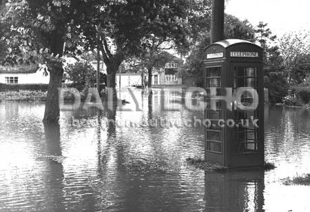 Sturminster Marshall is flooded in ta storm in 1979.