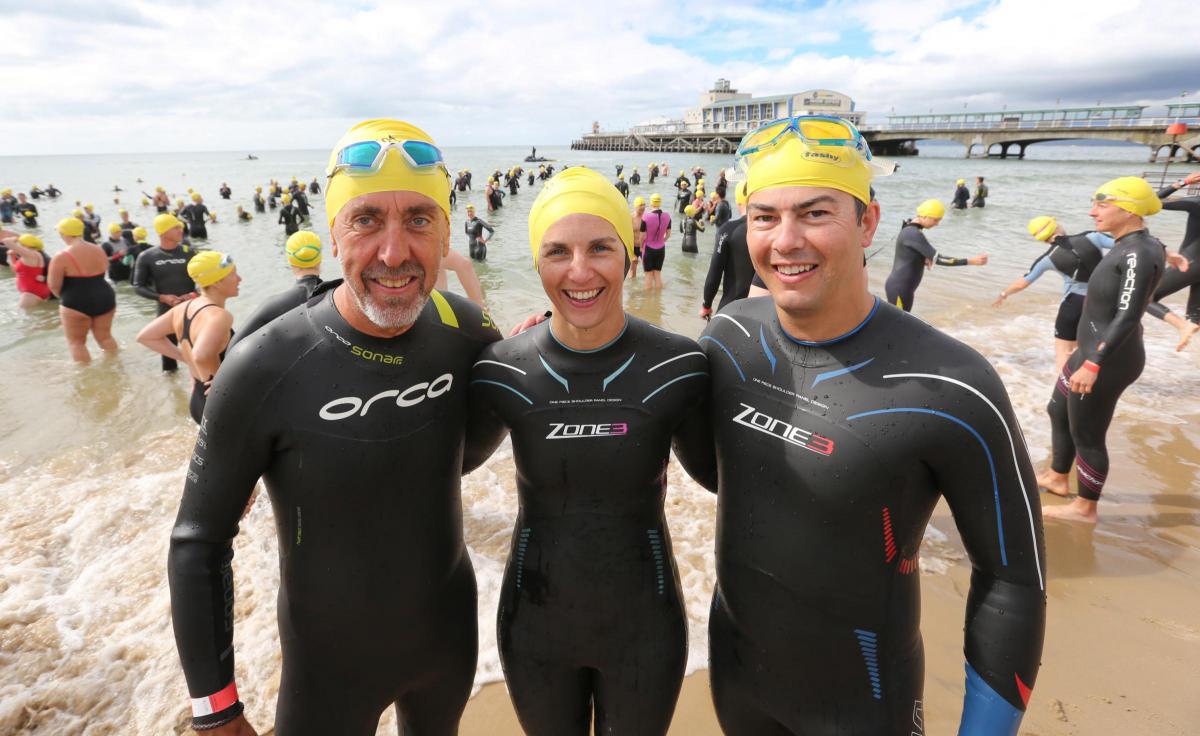 More than 2,000 people swam the 1.4-mile stretch between Bournemouth and Boscombe Piers to raise funds for the British Heart Foundation in the annual Pier to Pier Swim on Sunday July 13.