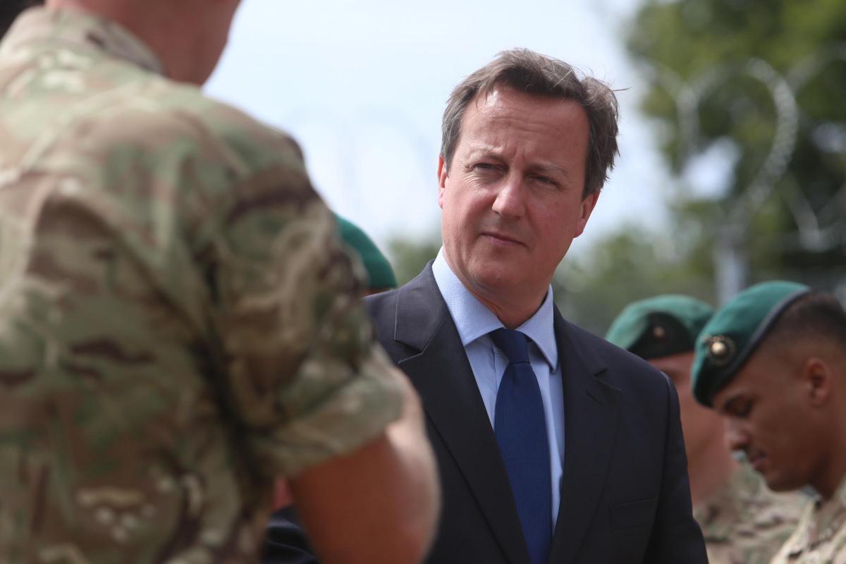 Prime Minister David Cameron and Chancellor George Osborne visit the Royal Marines base in Poole on Friday August 1, 2014