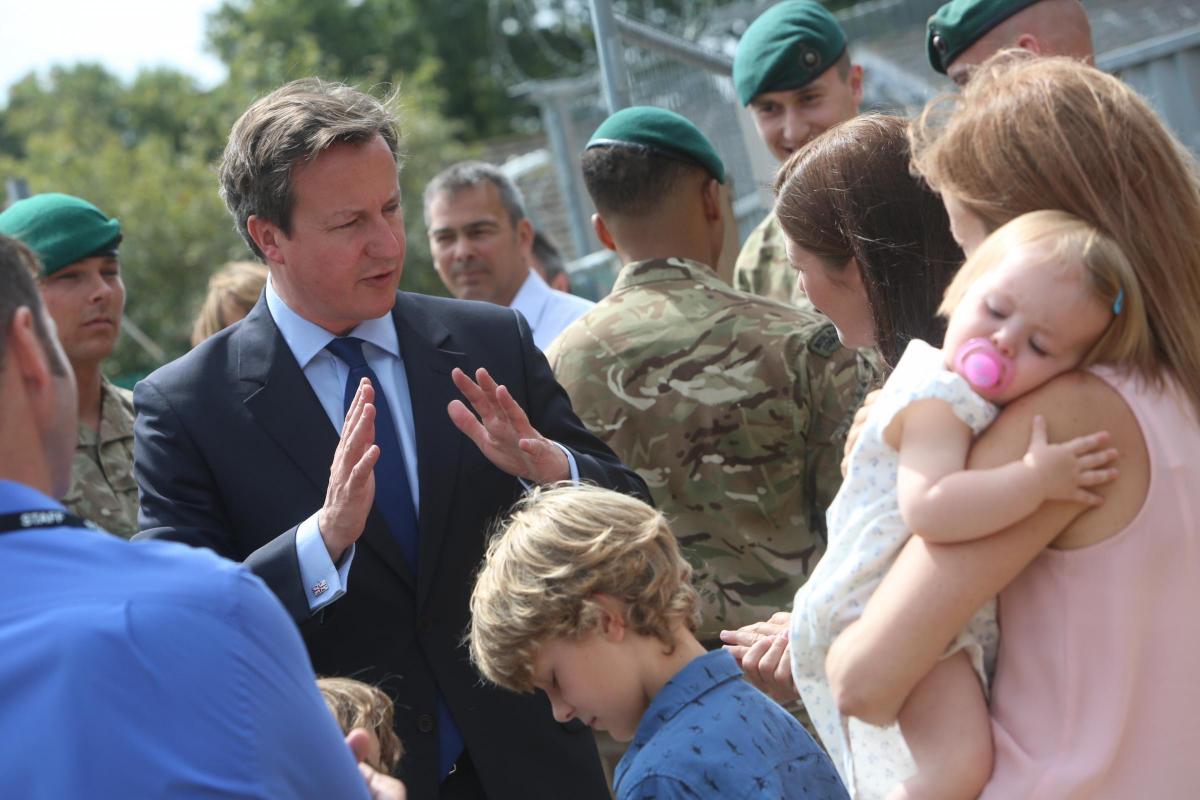 Prime Minister David Cameron and Chancellor George Osborne visit the Royal Marines base in Poole on Friday August 1, 2014