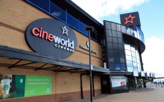 Cineworld in talks to merge with rival Cineplex after filing for bankruptcy, reports say (Mike Egerton/PA)