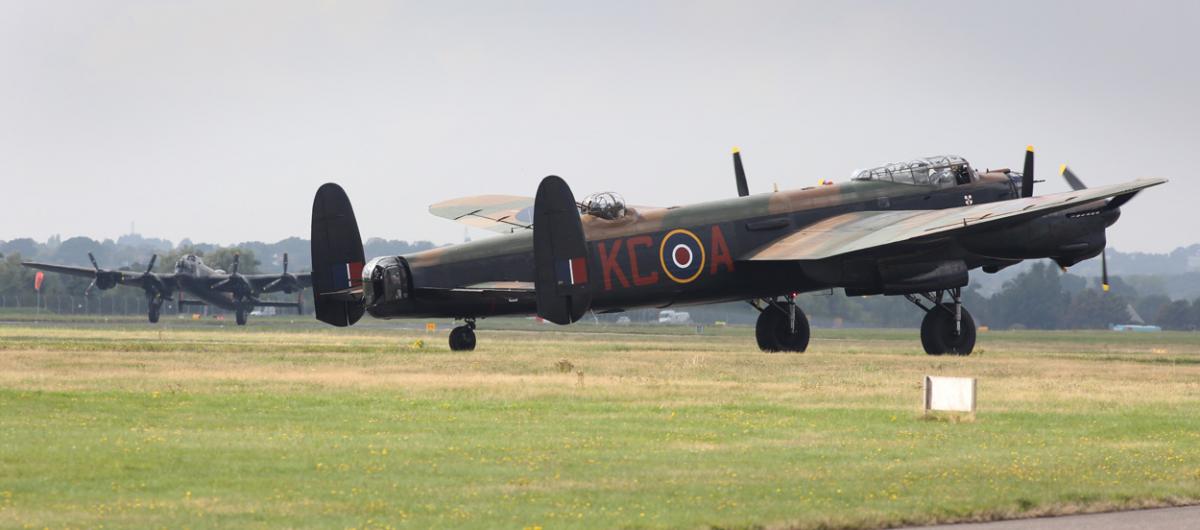 The world's two airworthy Lancasters fly in to Bournemouth Airport. Photos by Richard Crease. 