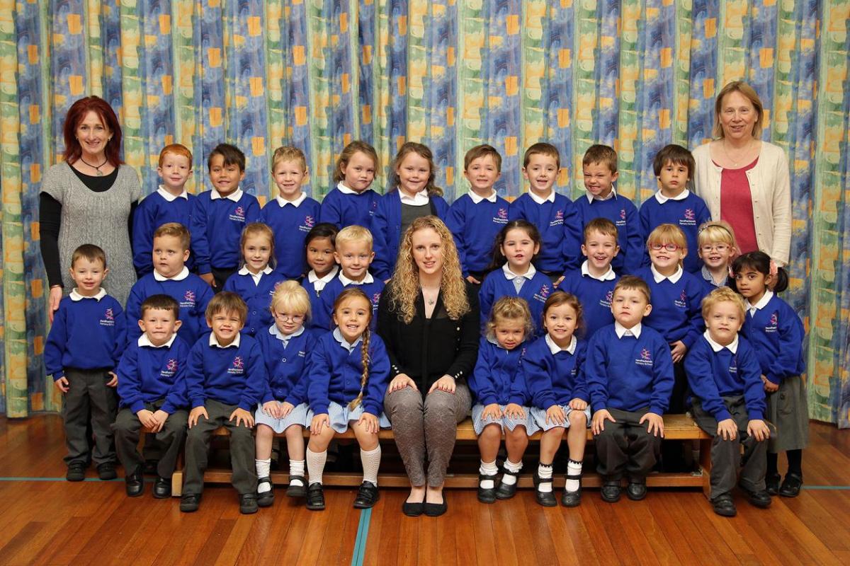 Rose Class at Heatherlands Primary School with teacher Ella Summers, centre, TA Di Treasure, right and TA Helen Marsh, left.