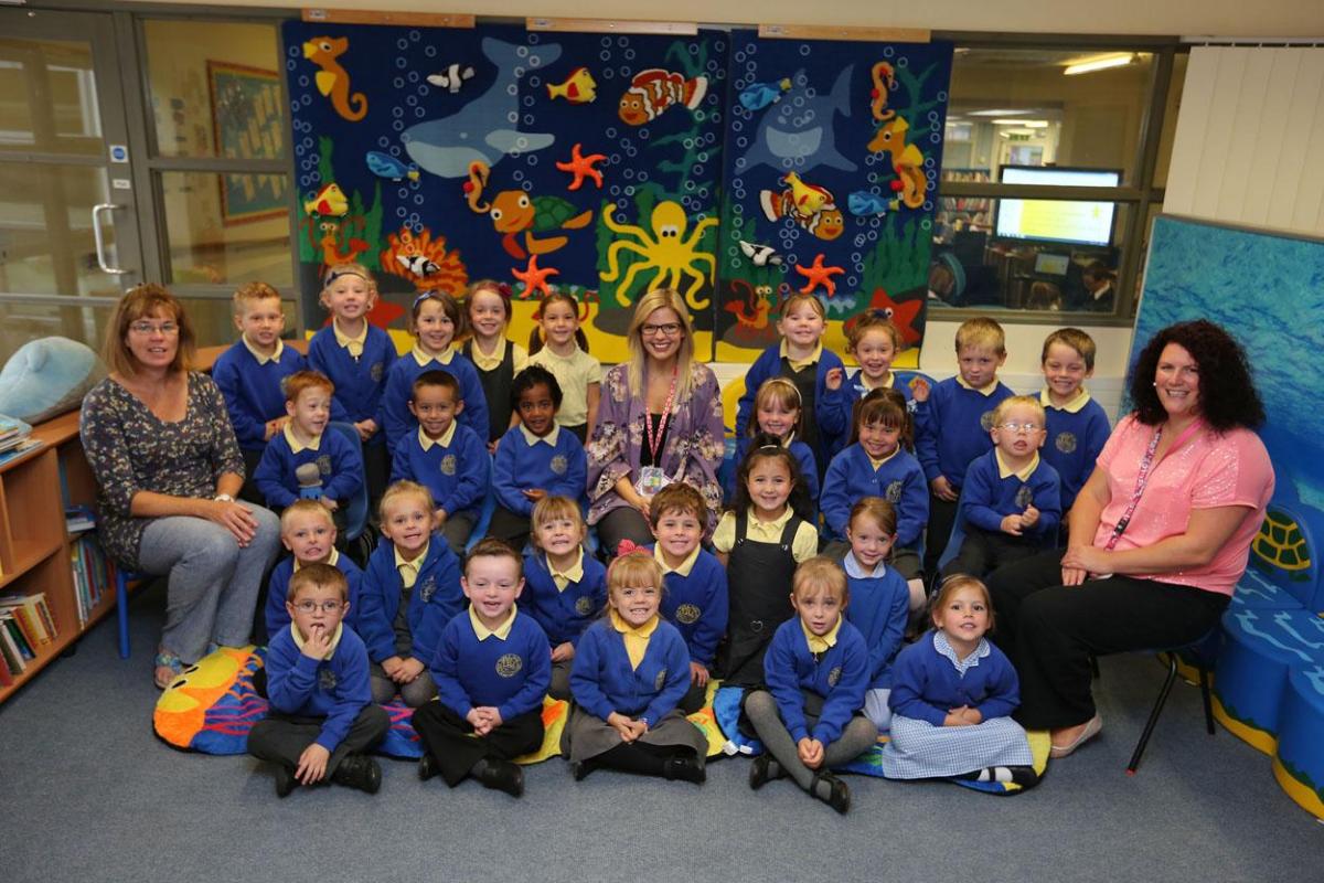 Reception children in Seahorses Class at  Twin Sails Infant  School  in Hamworthy with, from left,  TA Jane Gibbs, teacher Hayley Dodds and  TA Helen Harrison-Barker