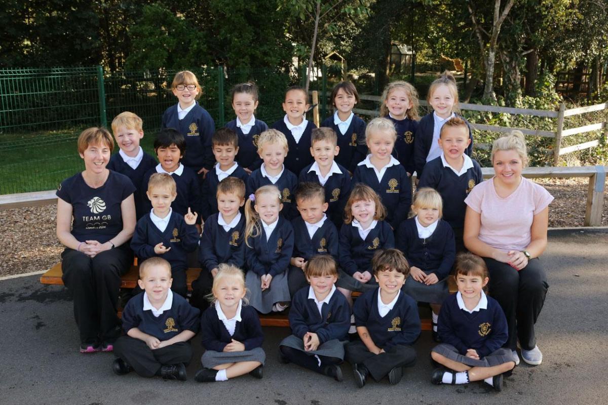 Reception children in  class RW at  Kings Park Primary school with teacher Karen Sainsbury and TA Laura Hirons.