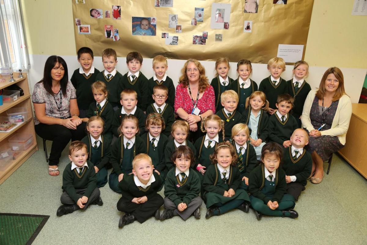Reception children in  Dolphins class at  St James Primary school with teacher Caroline Eggart, centre, and TA's Irene Dimambro and Sally Jones