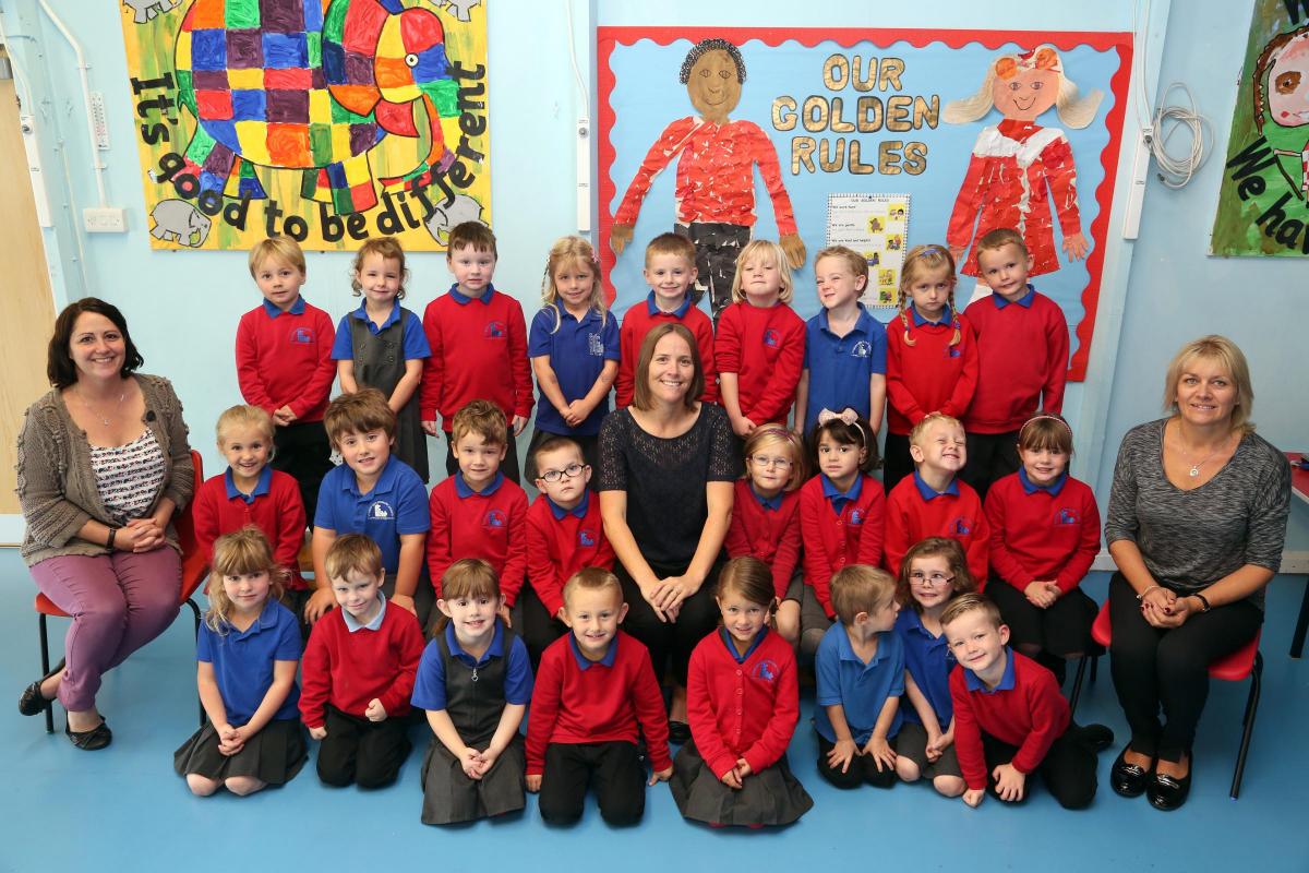 Reception class children in RCC Class at Somerford Primary School with TA Lucy Bedford, teacher Cath Cook, and TA Lisa Etheridge.