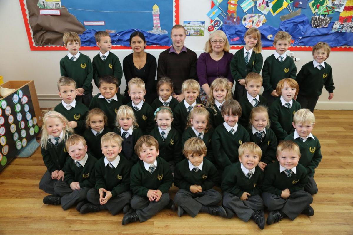 Hill View Primary School pupils with, left to right, TA Gloria Holmshaw, teacher Peter White and TA Lynda Hamlyn.