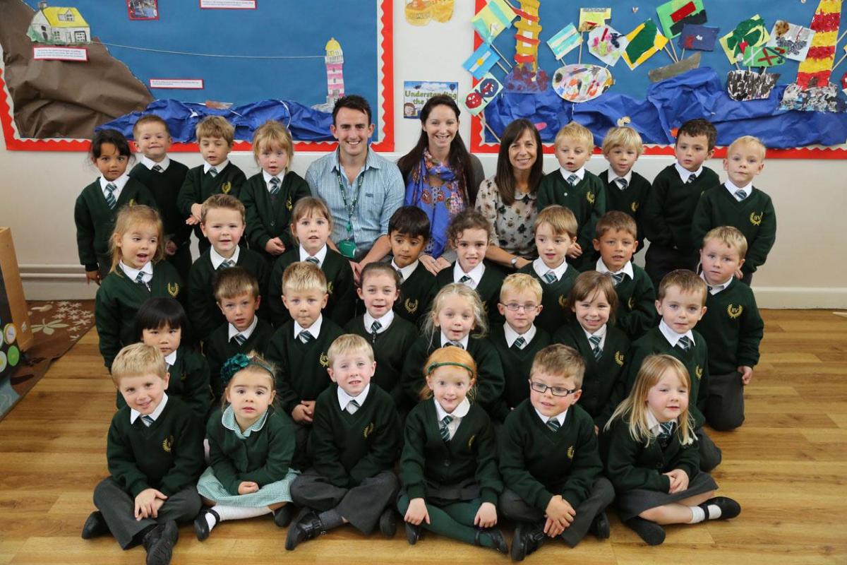 Hill View Primary School pupils with, left to right, TA Myles Clark, teacher Emma Homer and TA Di Hunt.
