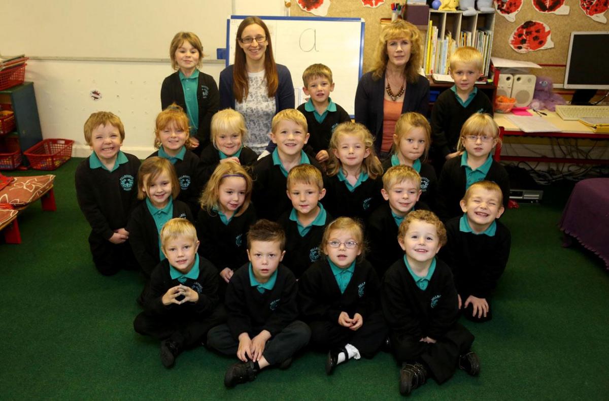 Reception class pupils at Hillbourne School and Nursery in Poole with teacher Zoe Nash and TA Teresa Cross.