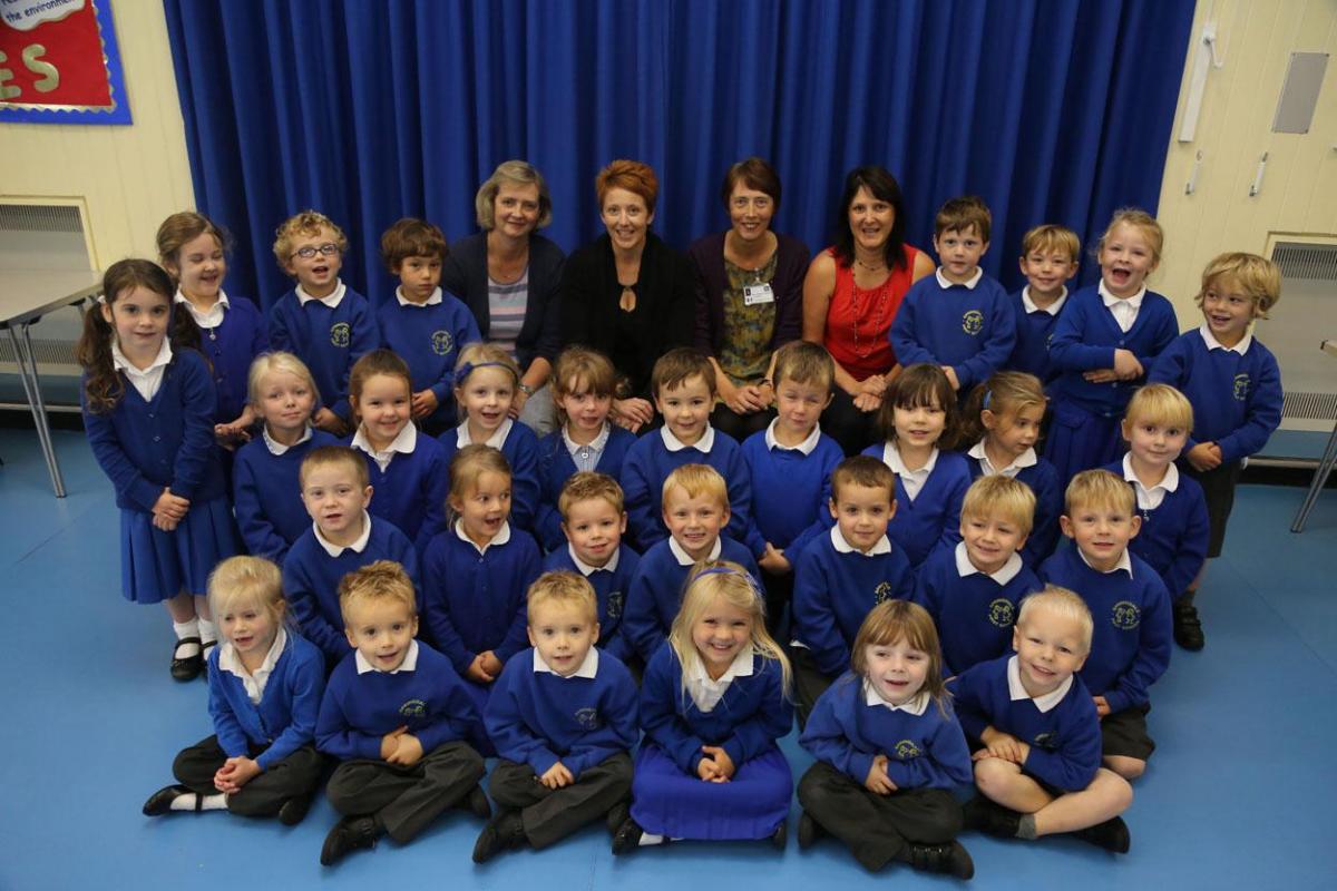 Springdale First School reception class pupils with, left to right, TA Rhona Smith, teacher Clare Blake, teacher Amanda Thomas and TA Elaine Collins.