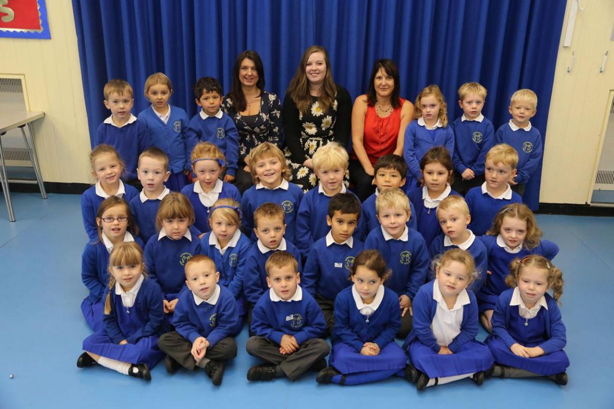 Springdale First School reception class pupils with, left to right, TA Lisa Southern, teacher Alice Rist and TA Elaine Collins.