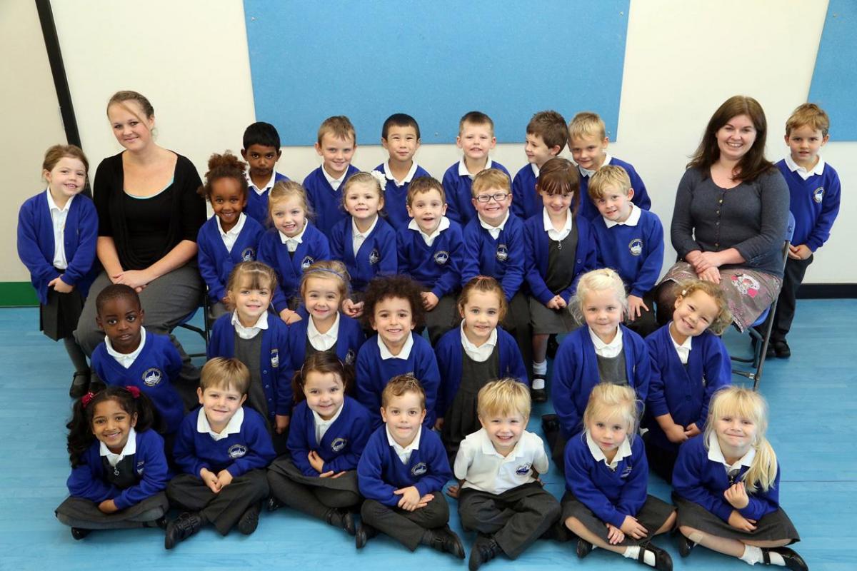 Children from Reception RLC class at Longfleet Primary School with TA Alice Dacosta, and teacher Louise Cox.
