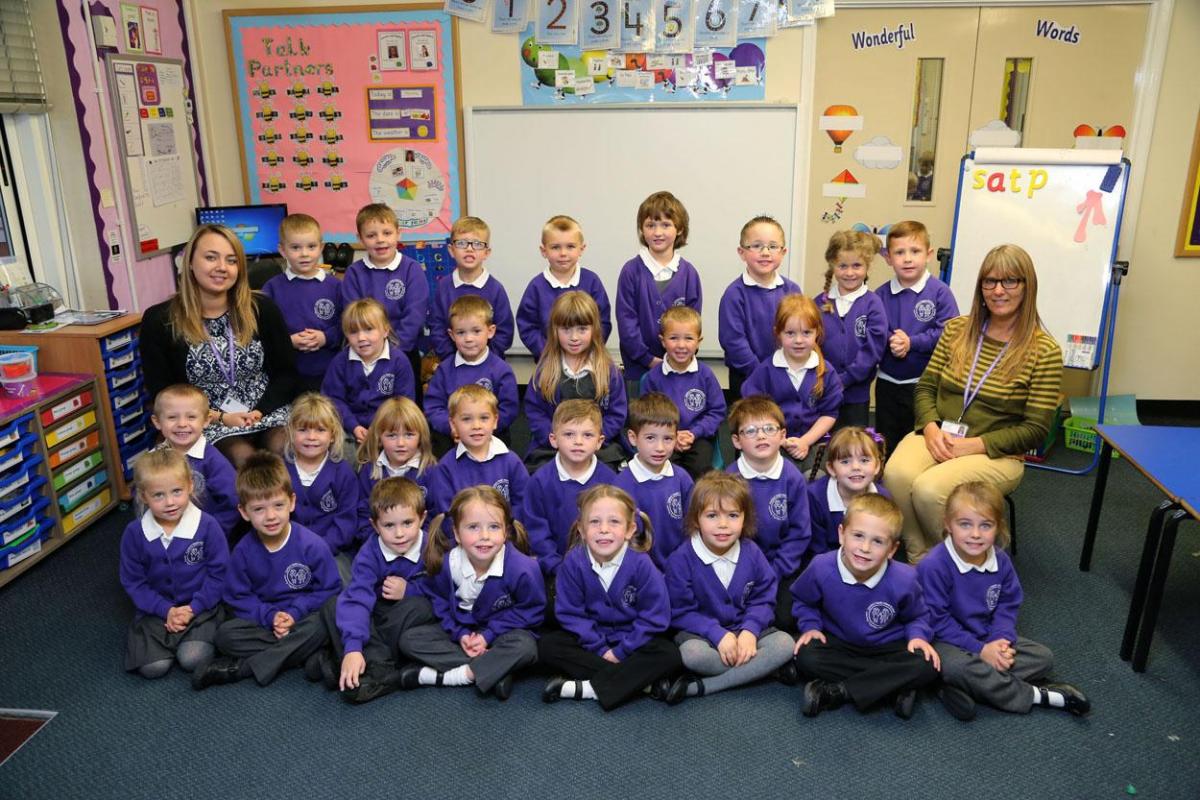 Reception children in Bumblebees class at Canford Heath Infant School with teacher Kirstie Huggins and TA Rosie Ambrose.