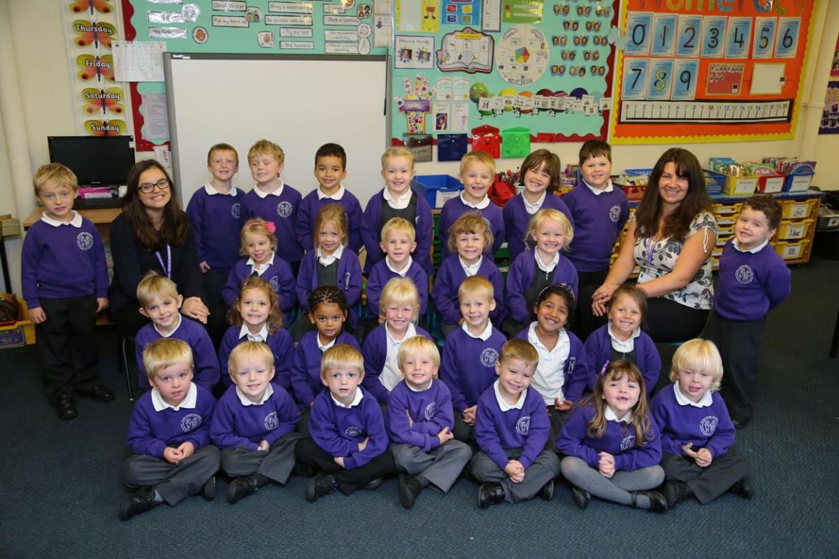 Reception children in Butterflies class at Canford Heath Infant School with teacher Alexandra Leedham and TA Sue Gould.