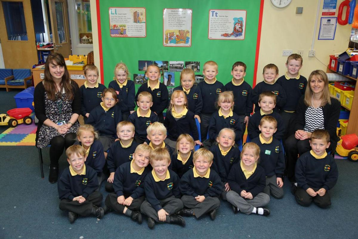 Reception children in Ruby class at Ferndown First School with teacher Fi Ramsden and TA Kerry March.