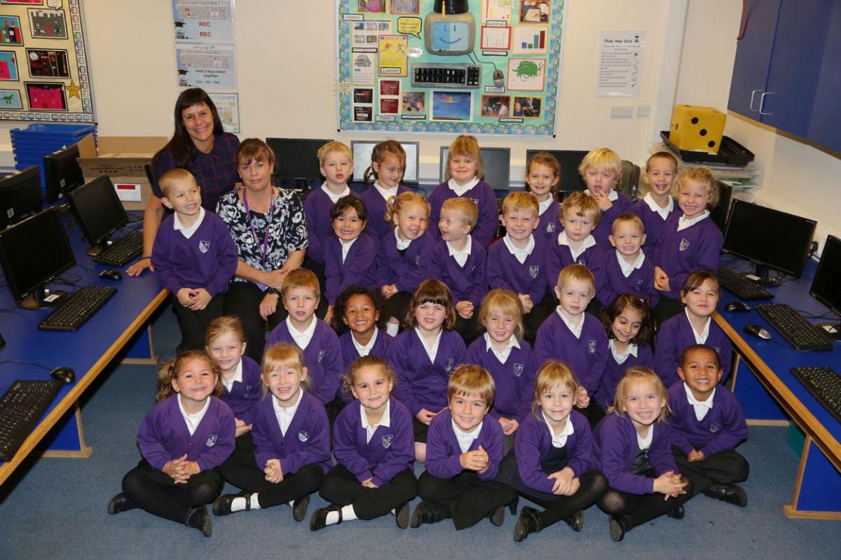 Reception children in Starfish class  at St Clement's and St Johns Infant School with teacher Mrs Burns and TA Mrs Butler-Sereno.