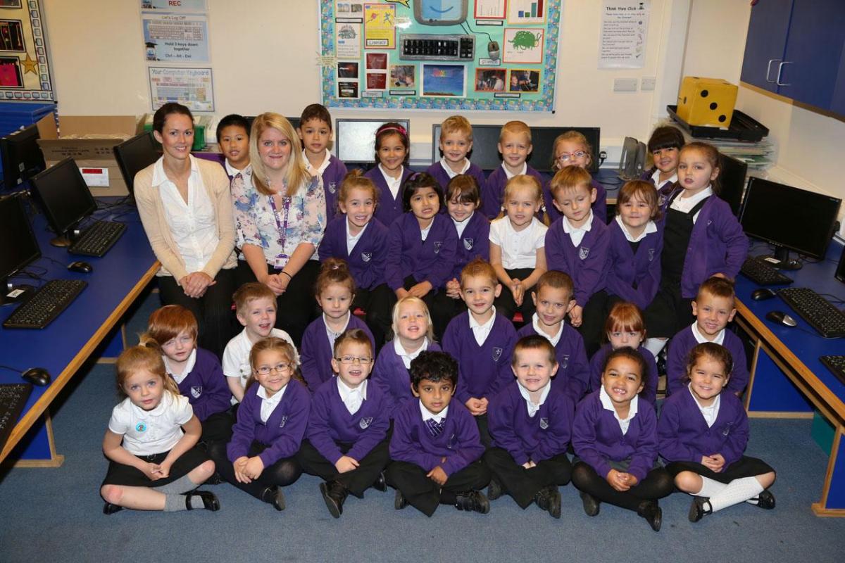 Reception children in Octopus class  at St Clement's and St Johns Infant School with teacher Mrs Arnull and TA Miss Mundy.