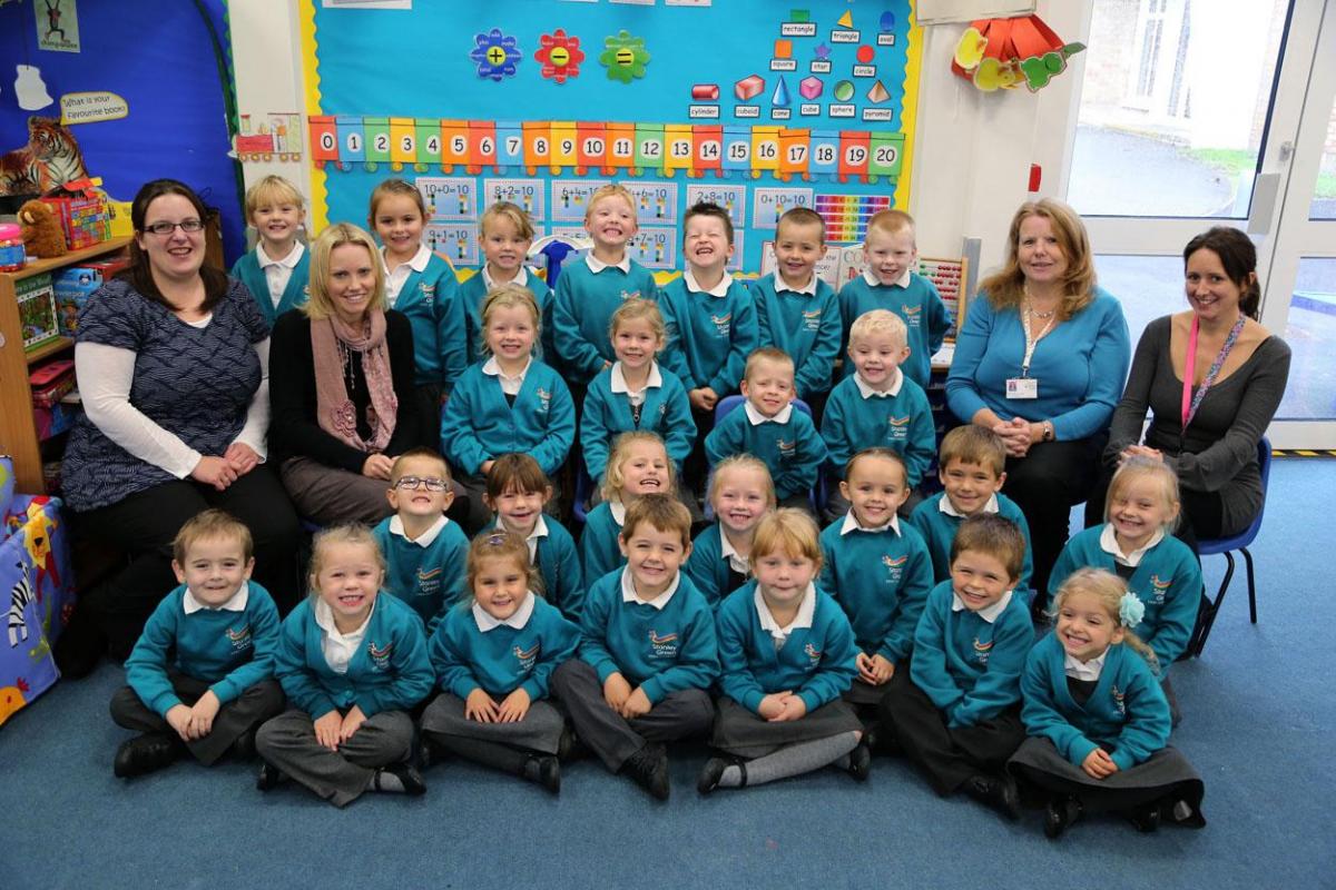 Reception children in Dragonflies class at Stanley Green Infant Academy in Poole with deputy head Elizabeth Coffin, teacher Amanda Layland and TA's Rebecca Cullen and Helen Colbert.