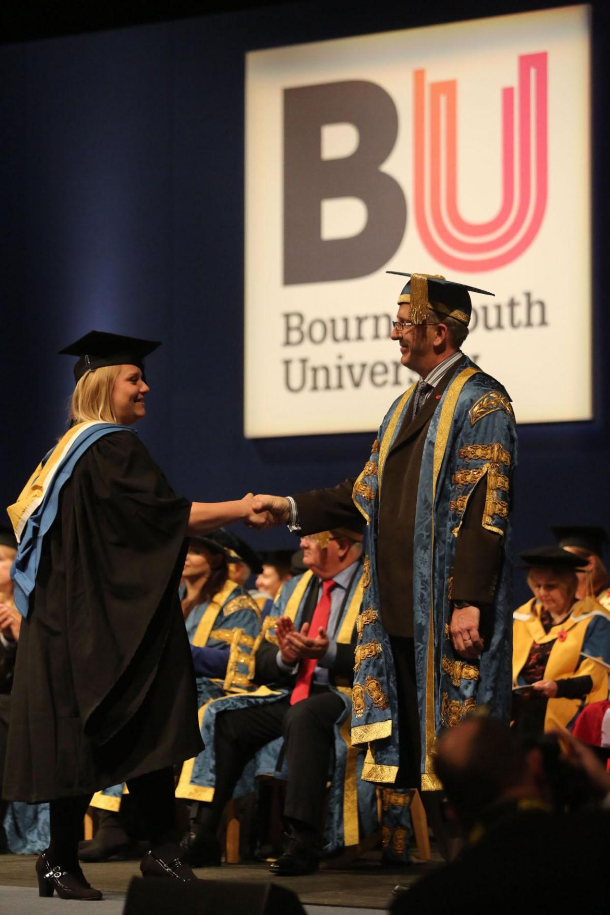 Students from the school of Health and Social Care graduate from Bournemouth University on 4th November 2014. Pictures by Corin Messer. 