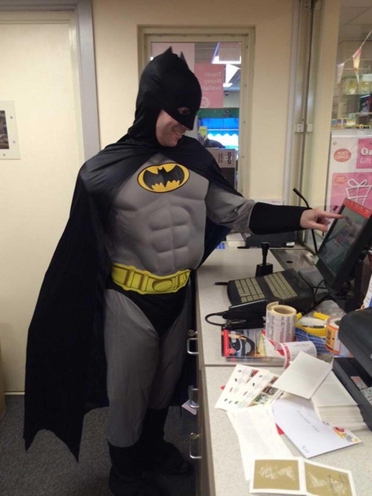 'Batman' serves customers at Boscombe East Post Office