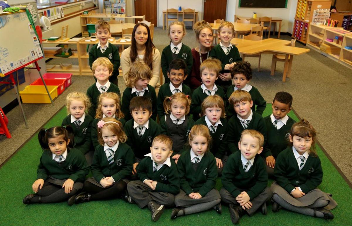 Reception class pupils with their teacher Shaula Maitland and, right, Montessori teacher Rebecca Callaghan at Parkfield School in Bournemouth. 