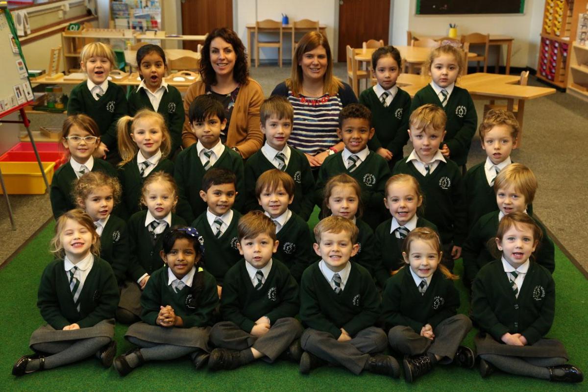 Reception class pupils with their Montessori teacher Tania Hunter and, right, teacher Charlotte Goodrum at Parkfield School in Bournemouth. 

