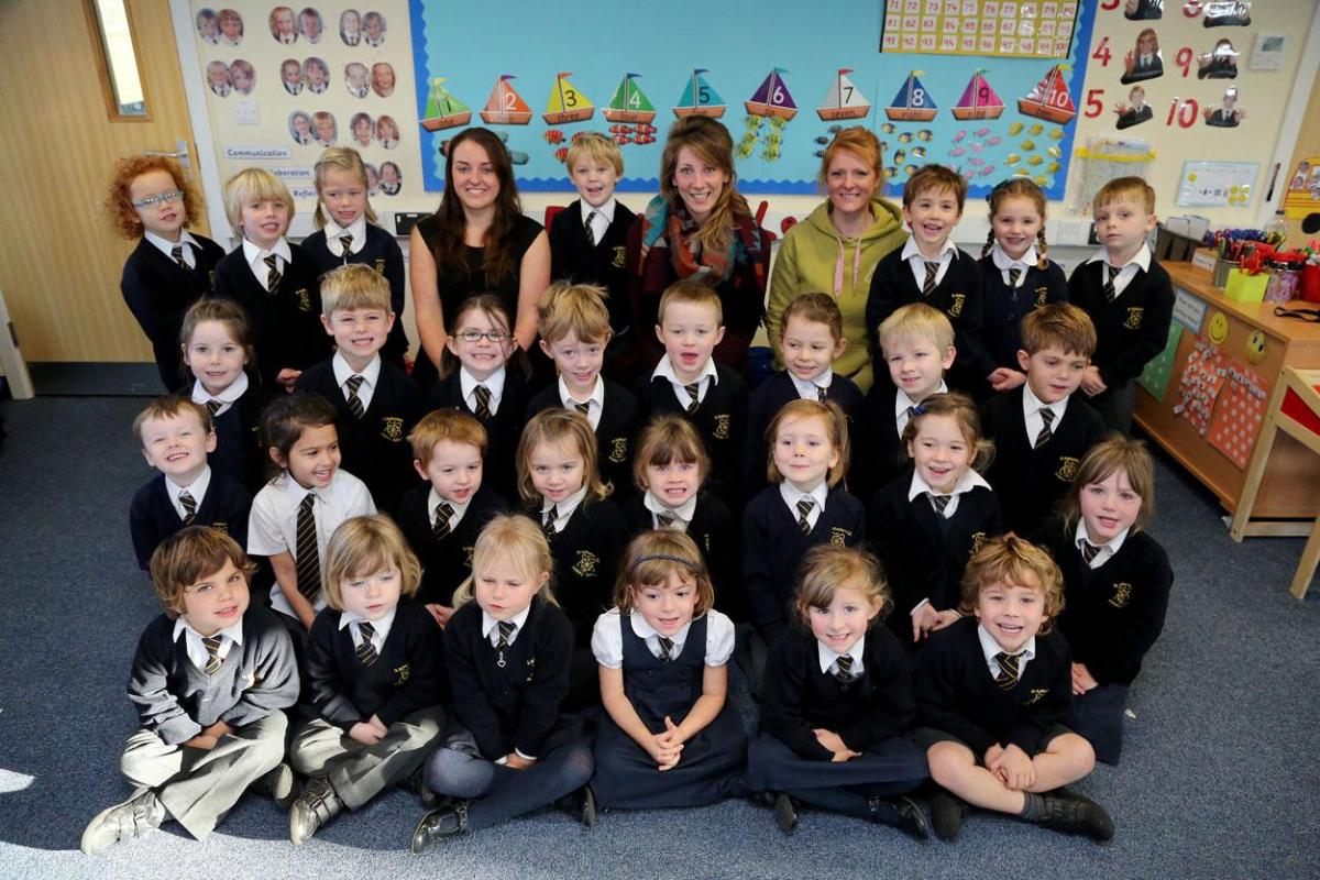 Reception class pupils in the Kingfishers class with teacher Sophie Hockey, TA Esther Wells and TA Verity Ochoa at St Katharines Primary School in Southbourne. 