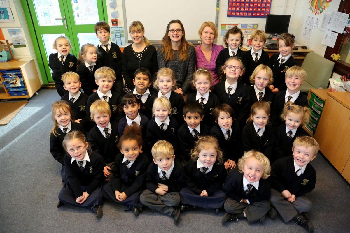 Reception class pupils in the Nightingales class with TA Linda Bain, teacher Vicky Miles and TA Sue Lovegrove at St Katharines Primary School in Southbourne. 
