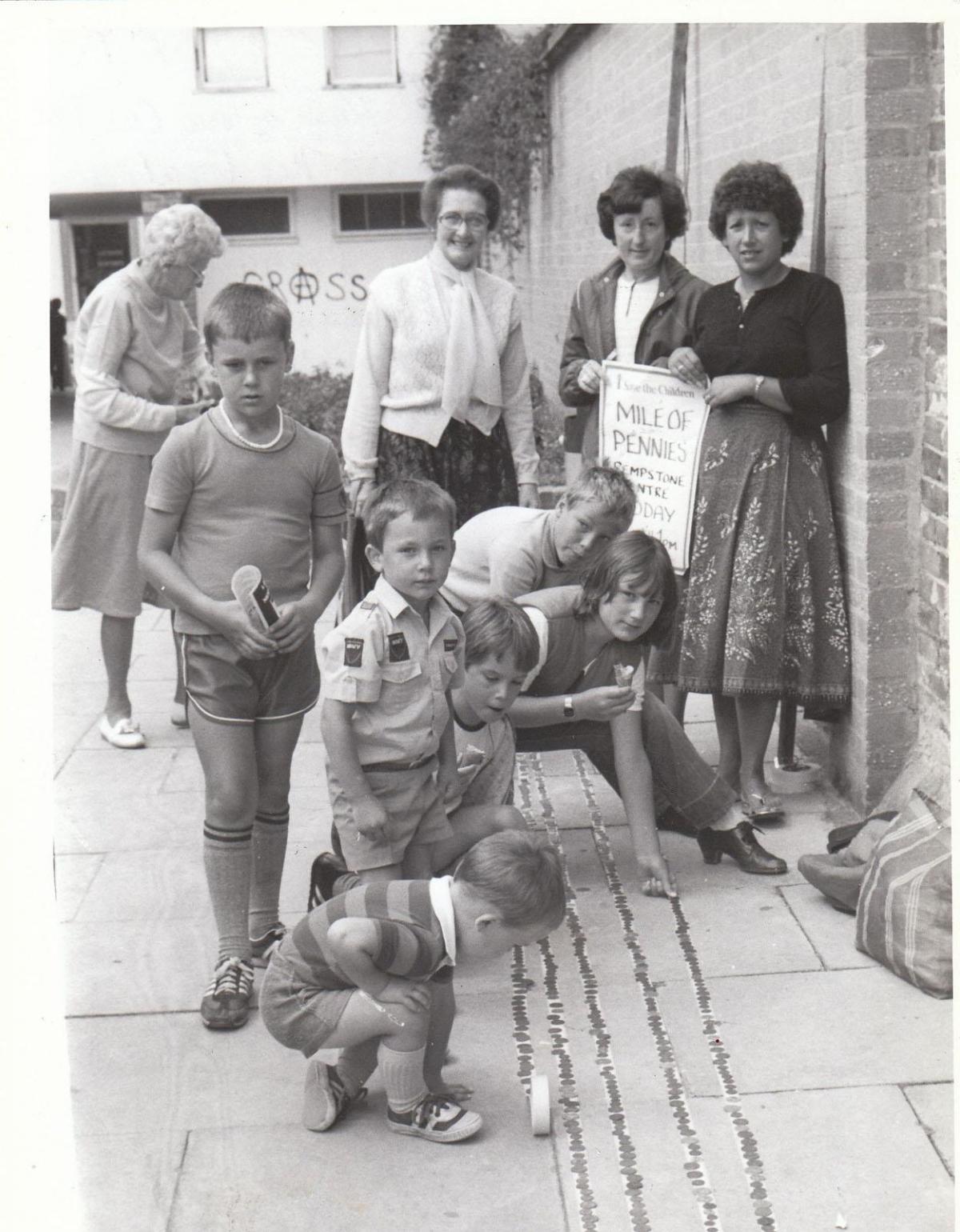 In August 1982, it was a case of children helping children at the Rempstone Centre at Wareham. The local branch of the Save the Children Fund organised a mile of pennies on the pavement.