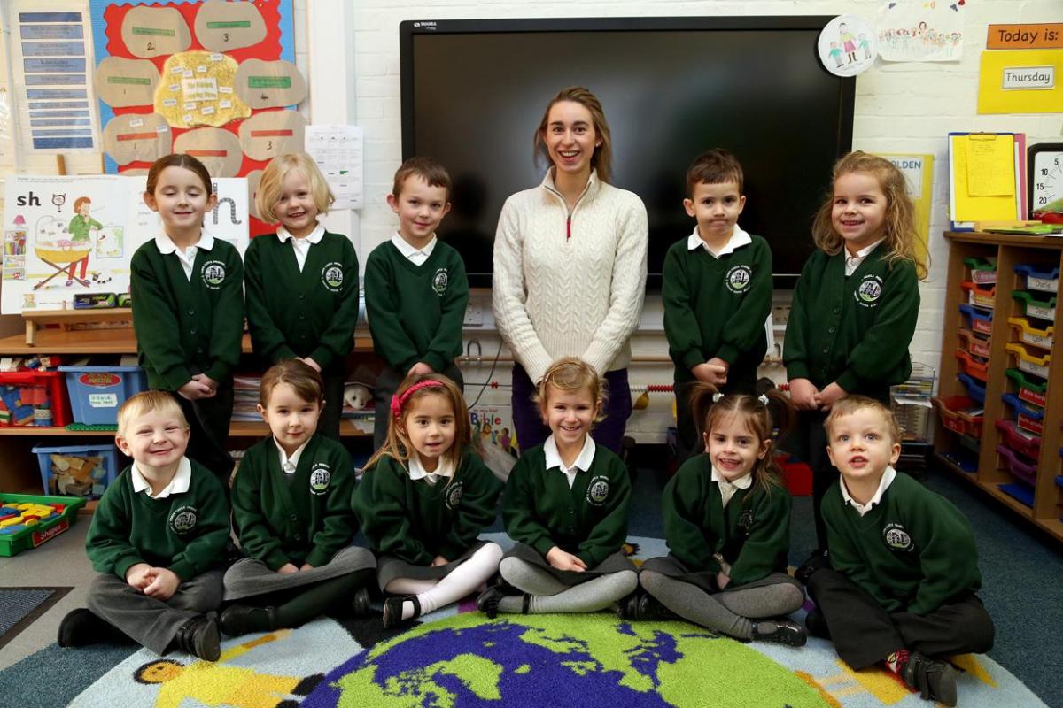 Reception Class at Corfe Castle Primary school with teacher Victoria Oakes.