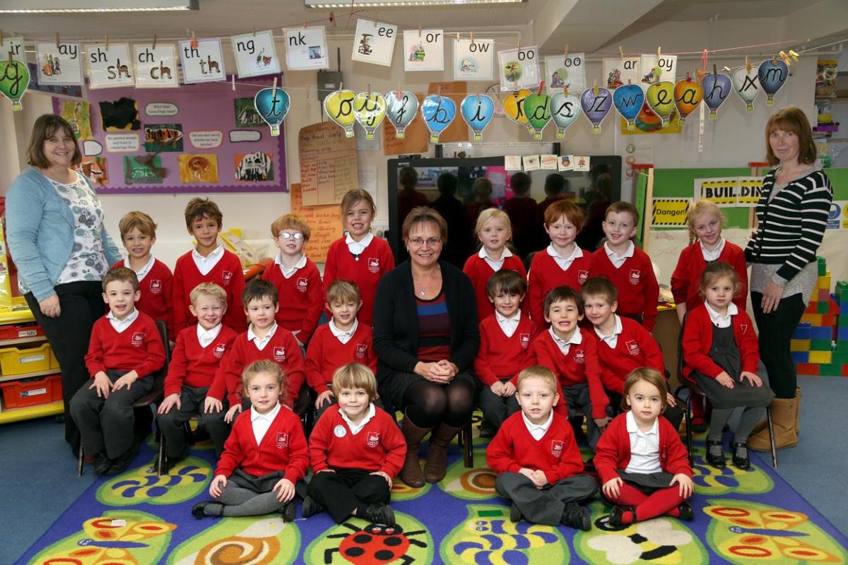 Reception class at Swanage Primary School with teacher Liz Hill, centre, TA Tracey Read, left and TA Sarah Yates.