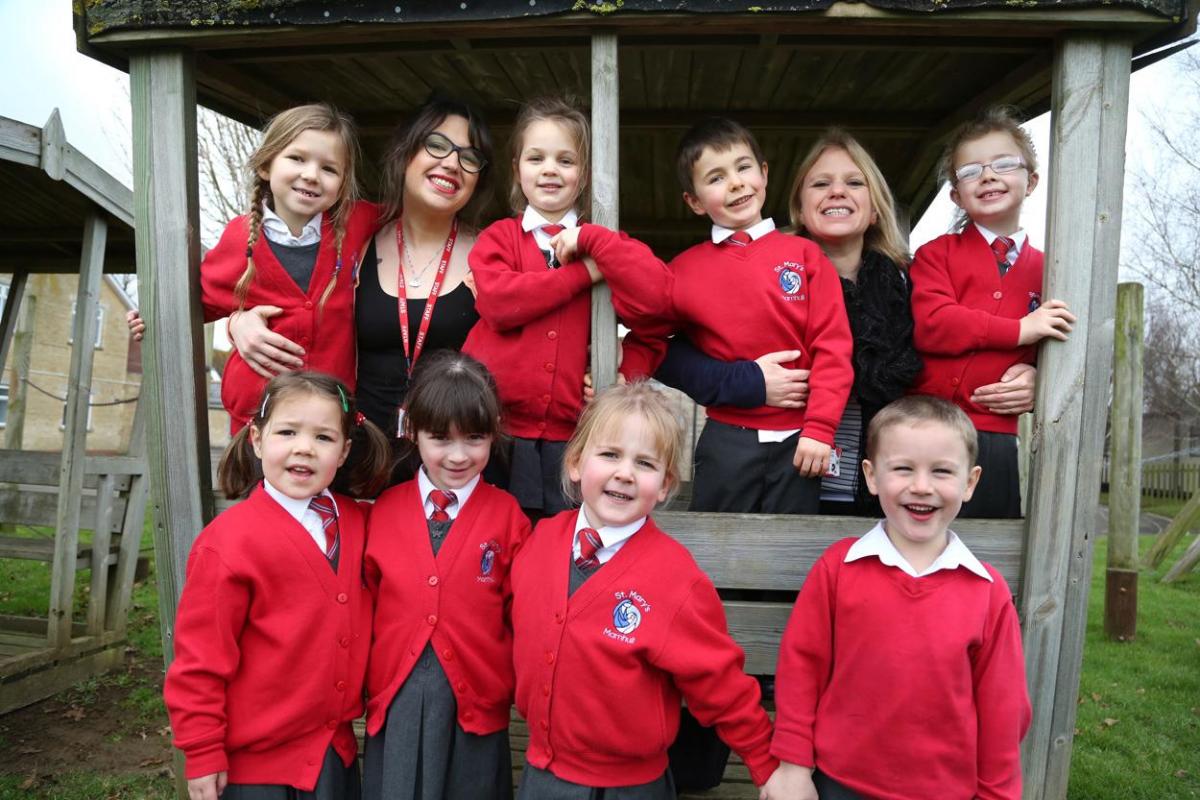 Children at St Mary's Catholic Primary School in Marnhull with teacher Hilly Webb, left, and  TA  Amber Gould.