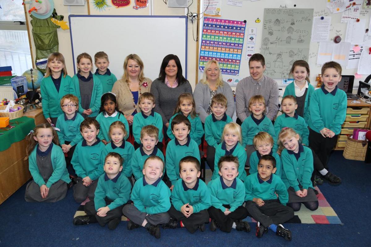 Reception children at Blandford St Mary Primary School with, from left, teacher  Susan Flavell and TA's Becky Millband, Denise Lacey and Jake Purser.
