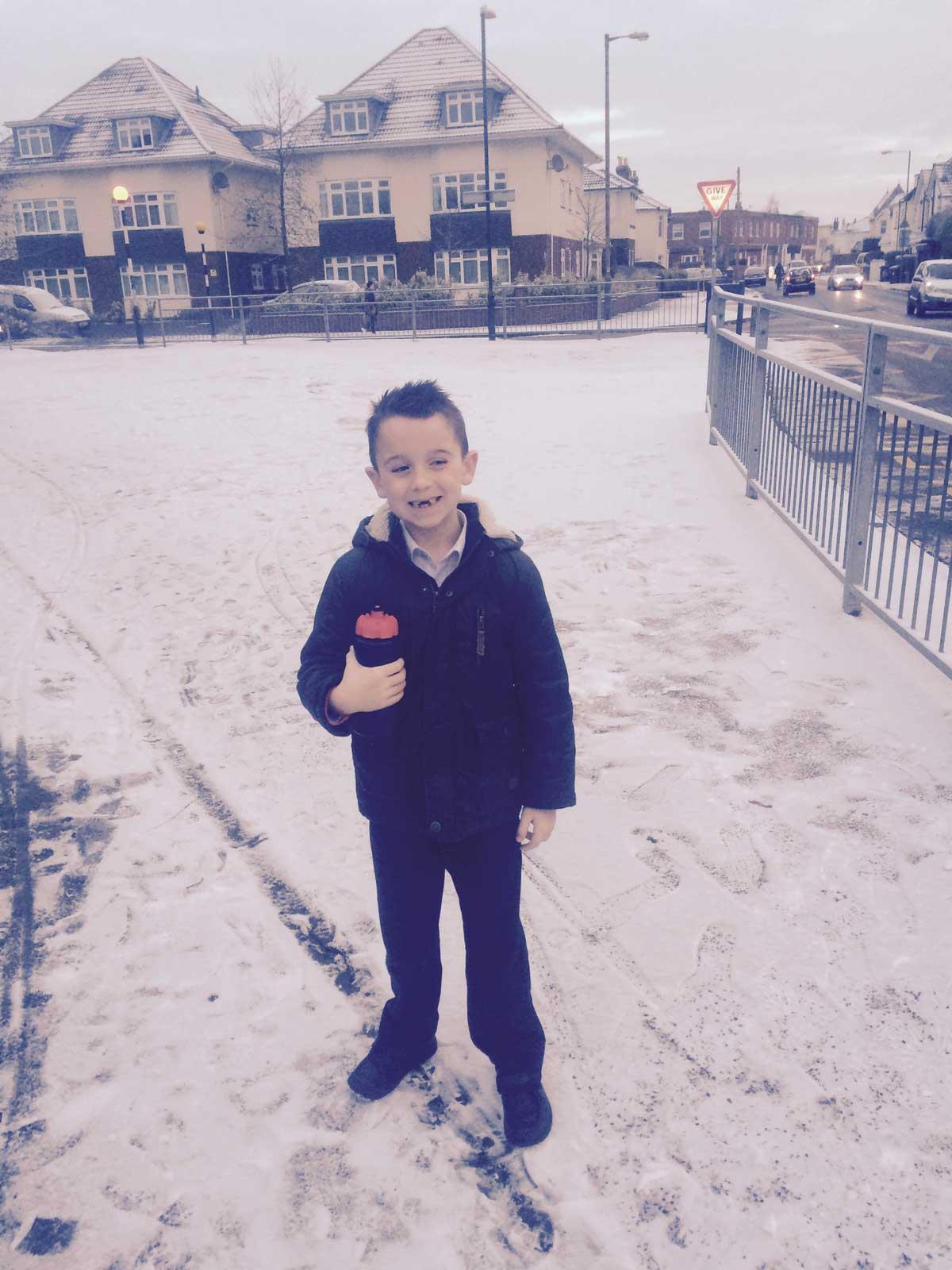 6 year old Harry Fitzgerald enjoying the snow at Malmsbury Park Primary School