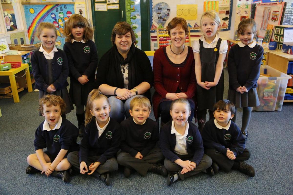  Reception class pupils at Hazelbury Bryan Primary School with trainee childcare worker Sue Fayers and teacher Hannah Gillibrand. 
