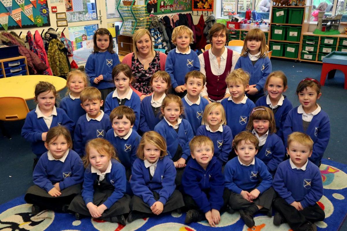 Reception class pupils at St Andrews Primary School in Fontmell Magna with teacher Amanada Bull and TA Susannah Morris. 
