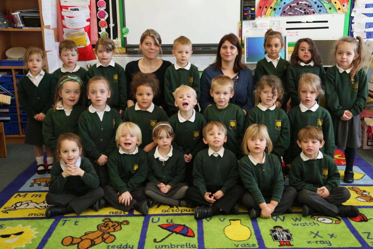  Reception class pupils at William Barnes Primary School with teacher Samantha Reed and TA Lisa Welch. 
 