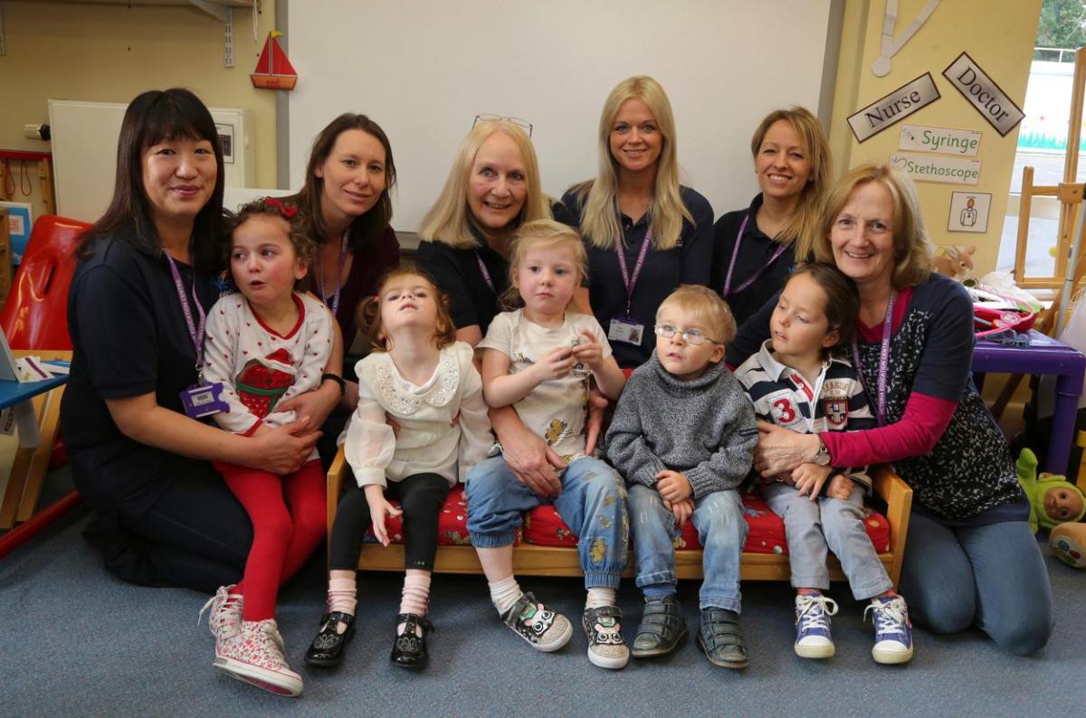 Reception children at  Victoria Education Centre with staff, from left,  May Cruz, Lois Main, Terry Whitlock, Beth Winter, Angie Aldous and  Gill Tuttiett.