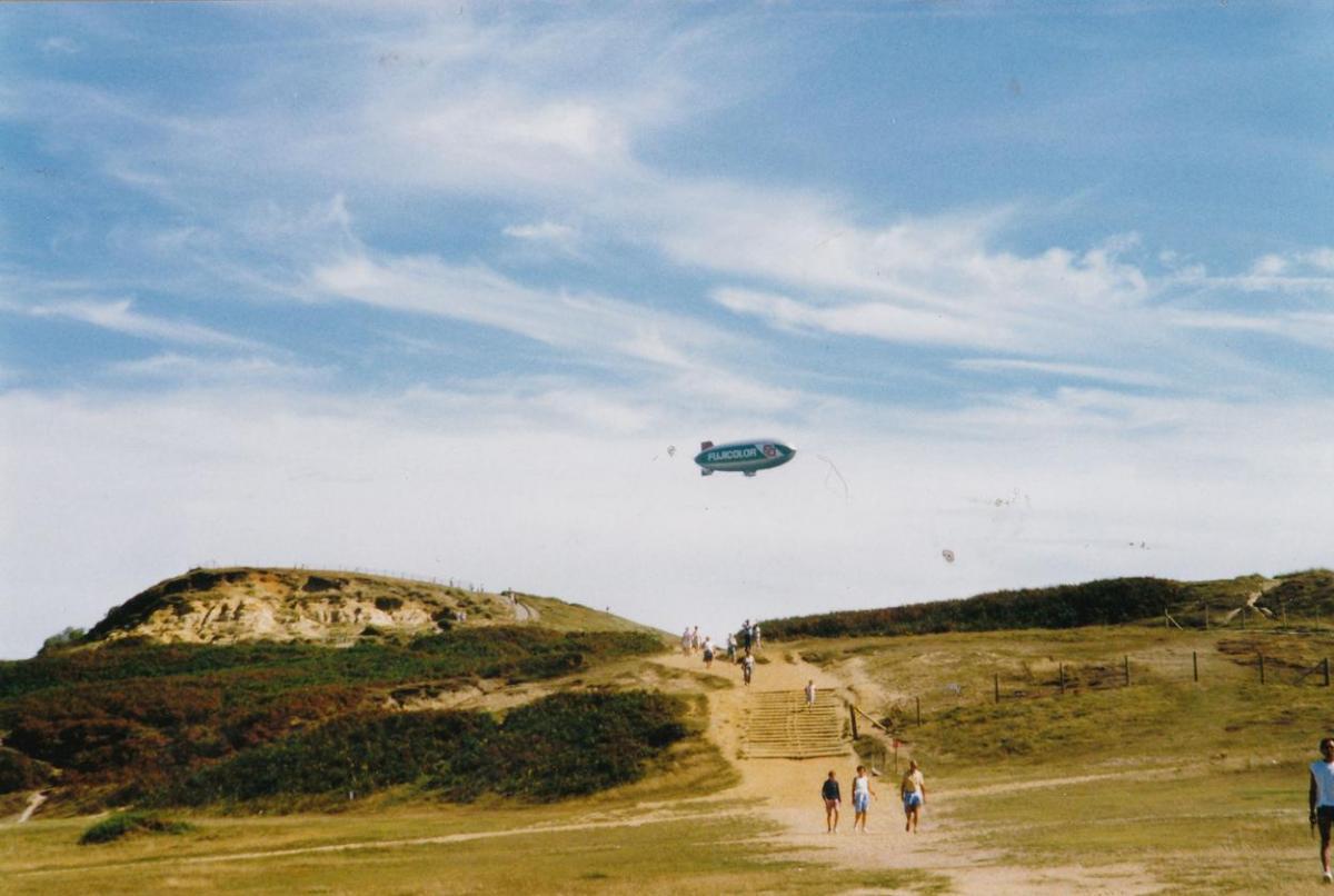 Hengistbury Head with a Fujicolor balloon in the sky 
submitted by Eric Johnson. Taken in the summer of 1990.