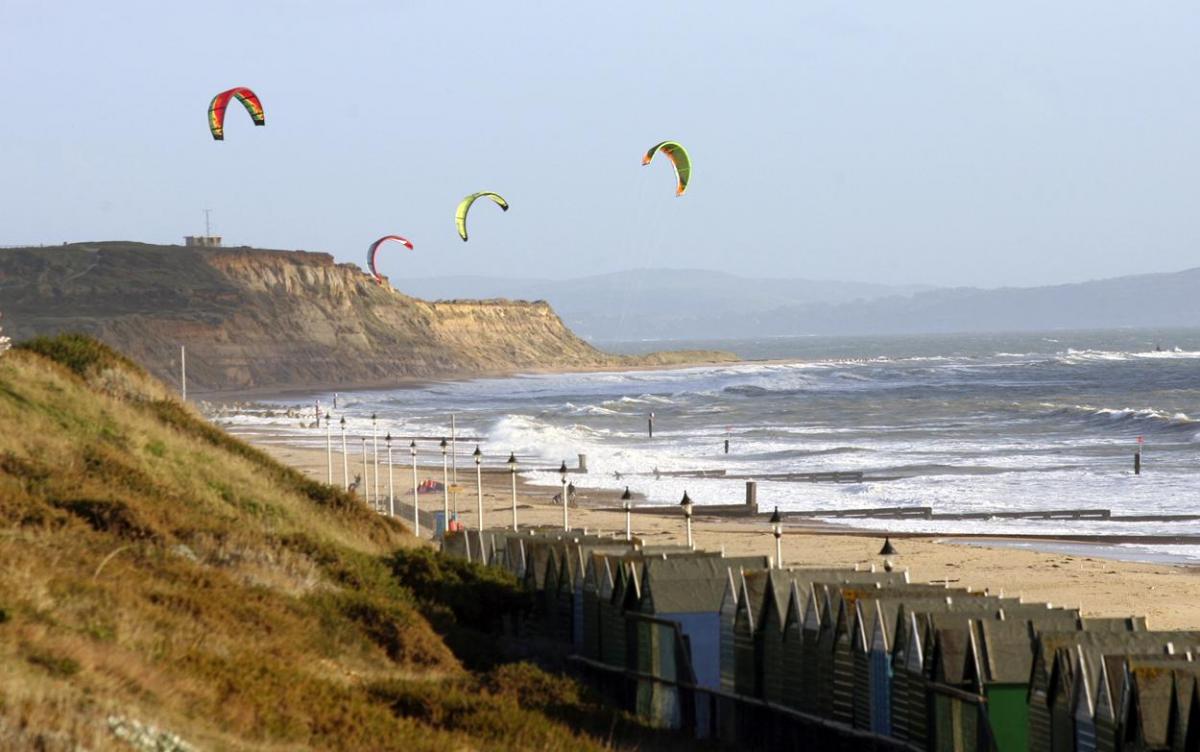 Pictures of Hengistbury Head beach through the years. Kite Surfers in 2006.