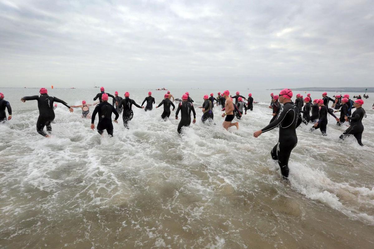 Picture by Richard Crease  - 27/09/14  Swimmers taking part in the Poole Open Water swim  off  Sandbanks beach in September 2014. By Richard Crease, Bournemouth Daily Echo