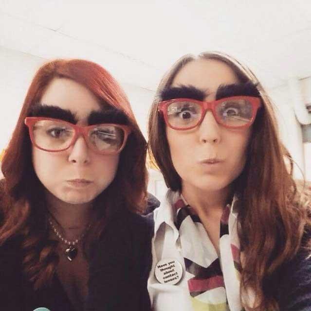 Emma Baker and Hayley Cox from Specsavers in Bournemouth sold comedy glasses in store to raise money for Red Nose Day