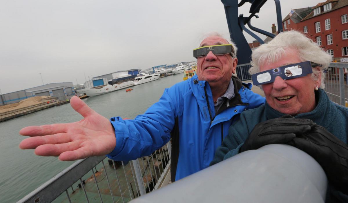 Pictures of the eclipse and people watching along Bournemouth seafront on 20th March 2015