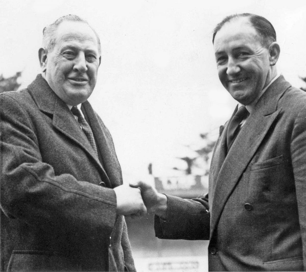 Reg Hayward, left, welcomes  Freddie Cox, right, Boscombe's new manager 14th April 1956.  A selection of the images that are featured in the Daily Echo, AFC Bournemouth Photographic Book.