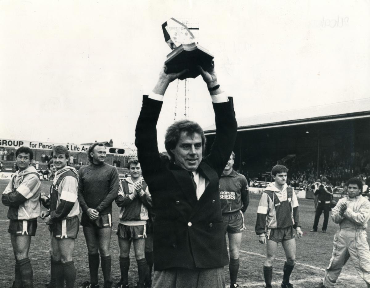 Harry Redknapp holds aloft the third Division Championship trophy 1987.  A selection of the images that are featured in the Daily Echo, AFC Bournemouth Photographic Book.
